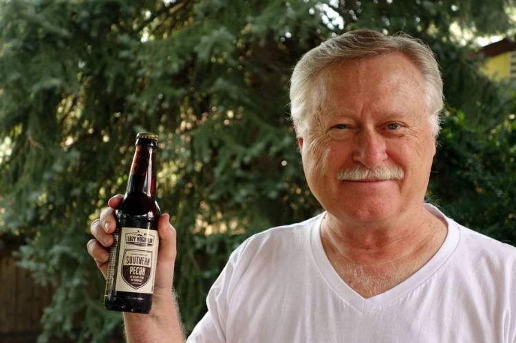 Harry with a bottle of Southern Pecan Nut Brown Ale